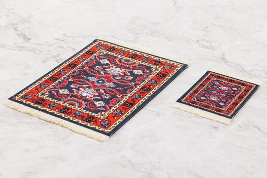 Two decorative rugs with intricate patterns on a light wooden floor.