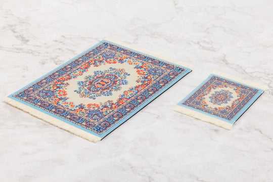 Two decorative rugs with intricate patterns on a light wooden floor.