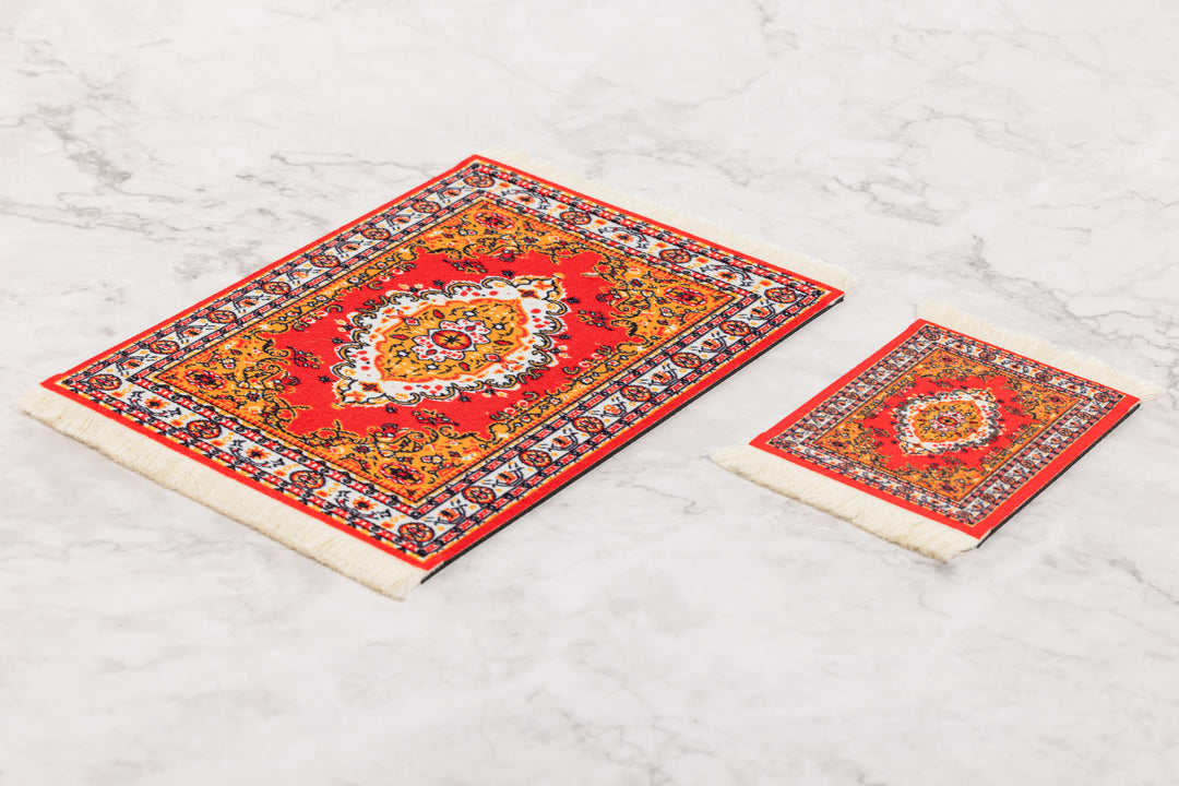 Two decorative rugs with intricate patterns on a light gray surface