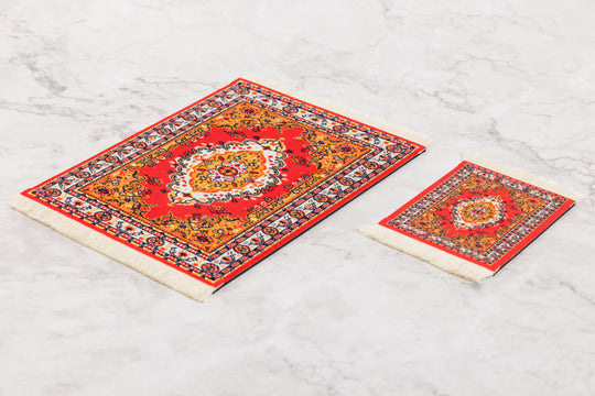 Two decorative rugs with intricate patterns on a light gray surface