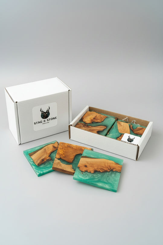 Wooden coasters with green resin on a wooden surface, branded &