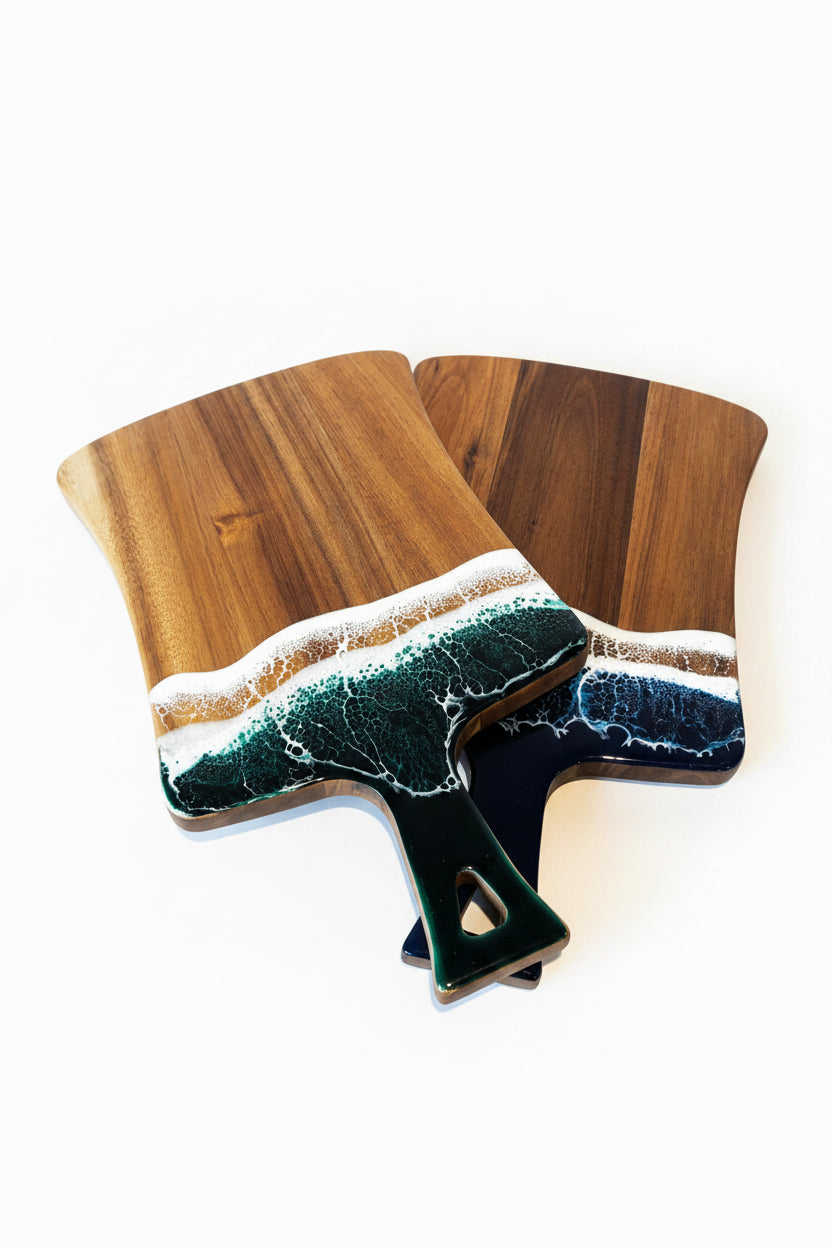 Wooden cutting board with a black and white pattern on a wooden surface