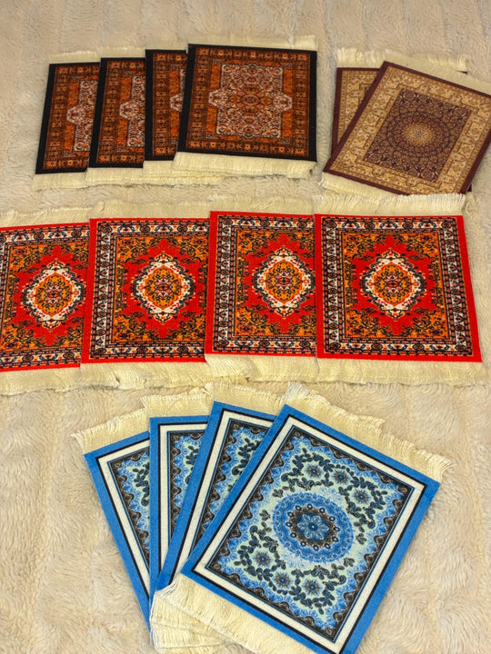 Collection of various patterned rugs on a beige floor.